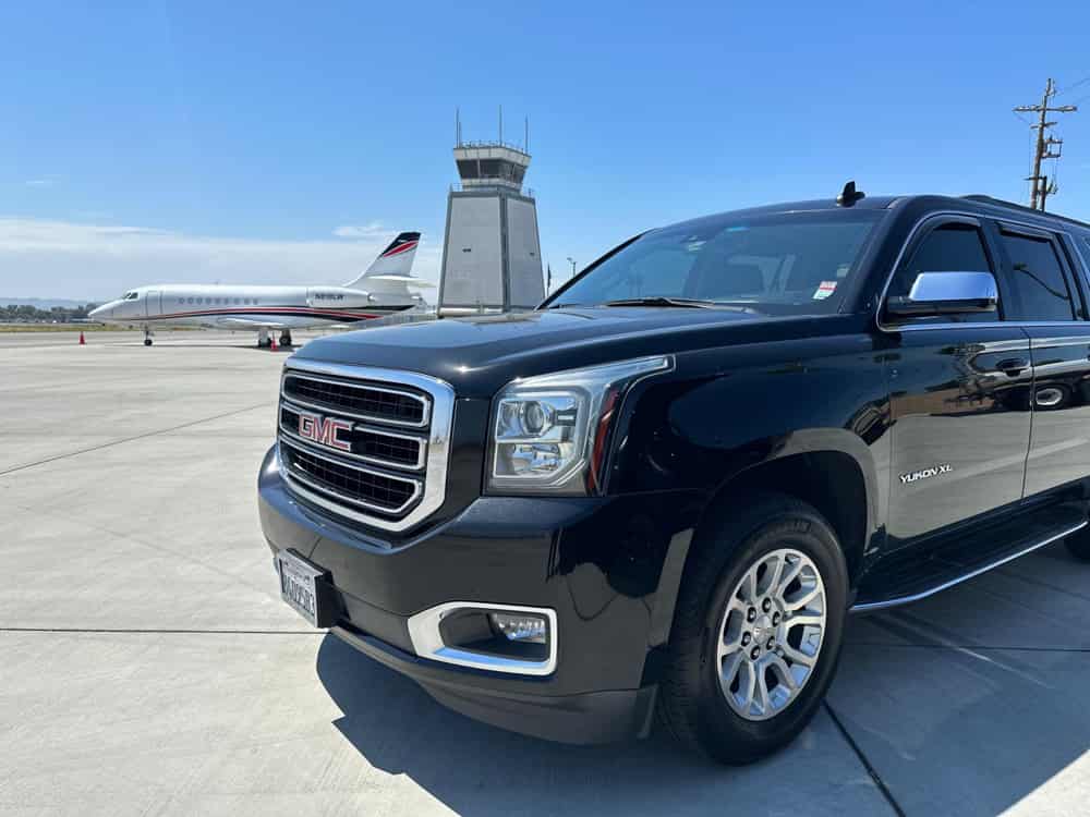 SUV in front of the airport